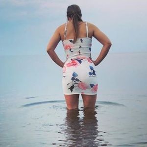 Cross top open stomach floral mini dress